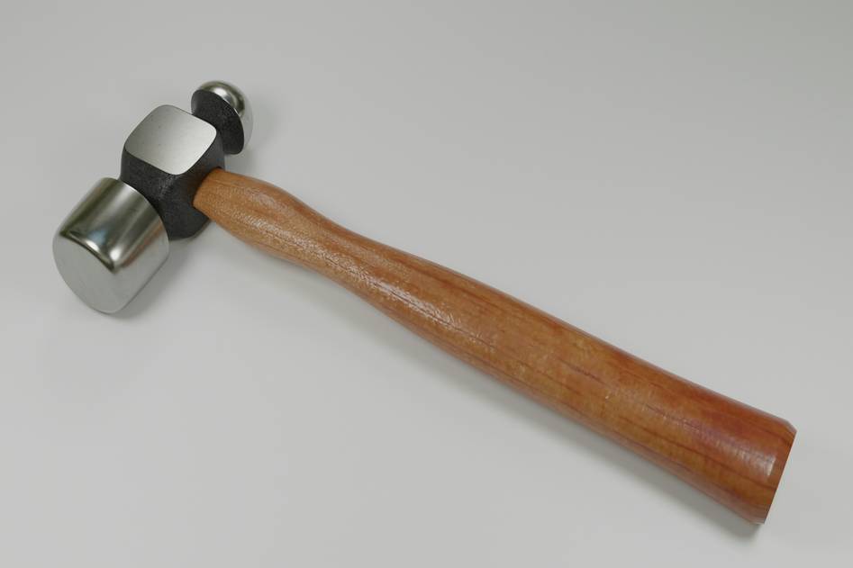 Hammer collection on wooden workbench