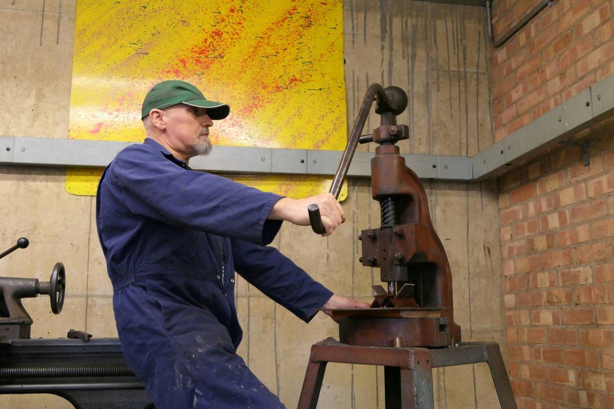Demonstration of safe hammer storage to reinforce how to use a hammer safely